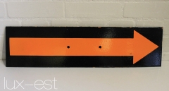 Original black enamel plate with orange arrow.